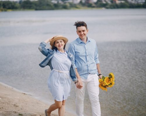 couple-near-water_1157-8129
